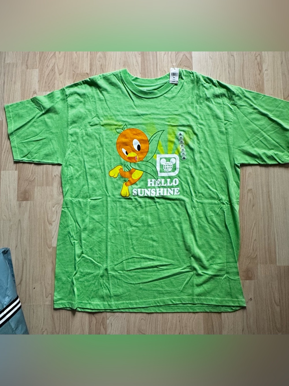 NWT Disney’s Adventureland Orange Bird Unisex Tshirt.